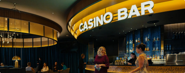 Visit Wrest Point's Casino Bar for a memorable night out, featuring a stylish bar area and a bustling crowd