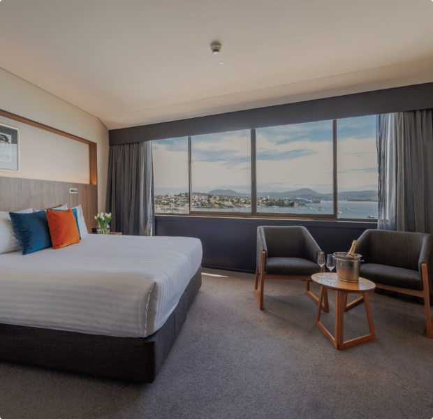 Relax in a Wrest Point Harbour View Room, offering a stunning outlook over Hobart's scenic waterfront from a well-appointed modern room